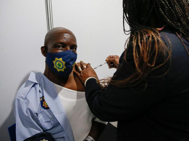 A member of the South African Police Services receives a dose of the Johnson and Johnson vaccine as the Delta variant grips the nation and other African countries. Picture: AFP