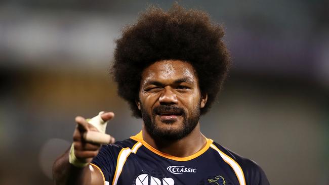 Henry Speight of the Brumbies celebrates with the crowd after scoring a try.