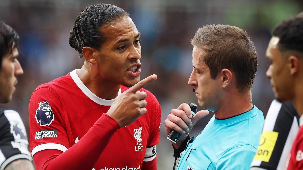 NEWCASTLE UPON TYNE, ENGLAND - AUGUST 27: Virgil van Dijk of Liverpool reacts after being shown a red card by referee John Brooks during the Premier League match between Newcastle United and Liverpool FC at St. James Park on August 27, 2023 in Newcastle upon Tyne, England. (Photo by Ian MacNicol/Getty Images)