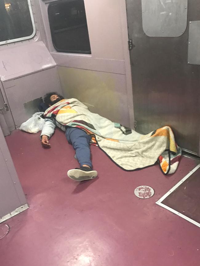 A man asleep on a Sydney-Newcastle train last week.