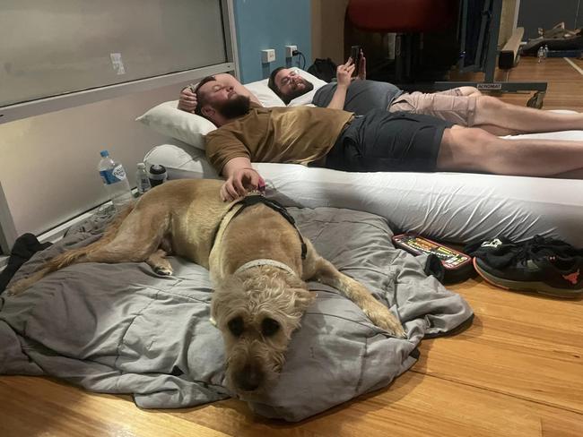 Paul Burckhardt, his husband Aaron and their dog Willow were relocating to Townsville when flooding trapped them in Bowen, but the community was soon ready to help. Photo: contributed