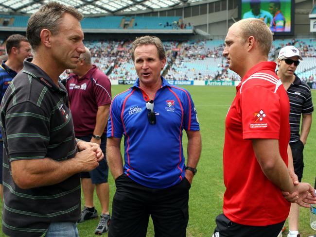 NRL - Fan Day at ANZ Stadium . NRL coaches ( L to R ) Neil Henry , Brian Smith , Nathan Brown , Matthew Elliott and Des HAsler Pic;Gregg Porteous