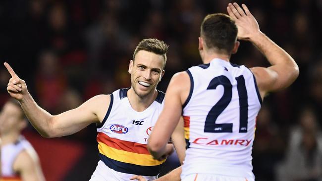 Brodie Smith and Rory Atkins celebrate a goal for the Crows. Picture: Getty Images