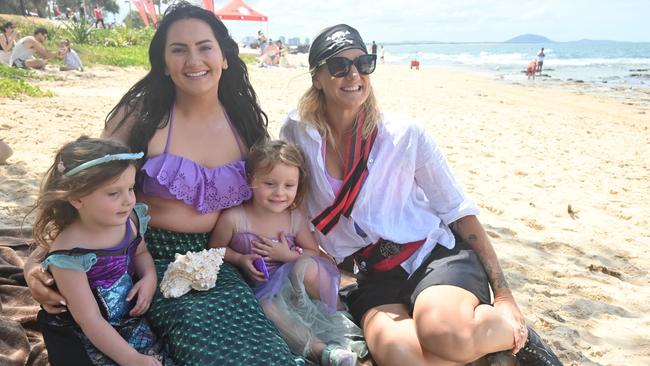 Sophie, 3 and Madeline Paton 3 with Mermaid Kalessi from Mermaid Connection and Pirate Elle at the Mooloolaba Foreshore Festival. Picture: Tegan Annett