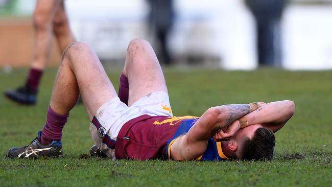 A dejected South Morang player after the 2019 Division 3 grand final. Picture: Andy Brownbill