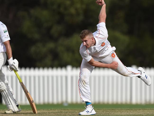 Matt Madeley bowling for Runaway Bay. Picture: Lawrence Pinder