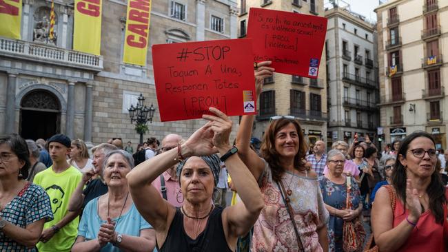 Protesters hold red cards with messages during a demonstration to call for the resignation of Rubiales. Picture: David Ramos/Getty Images