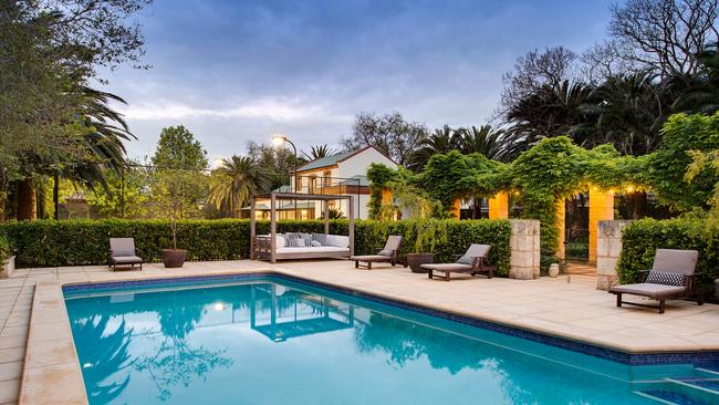 The pool and renovated grounds of the Medindie mansion.