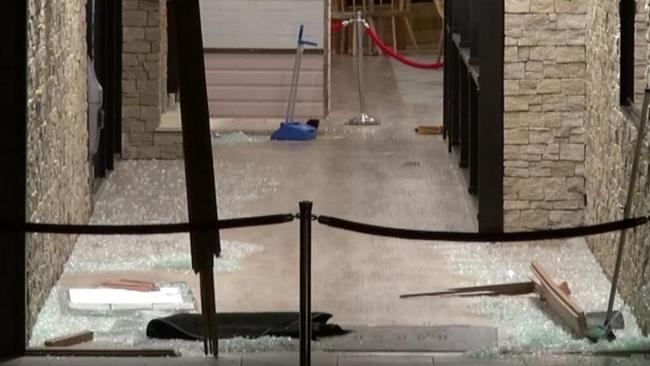 Damage from a car that reversed into the Robina Pavilion. Supplied