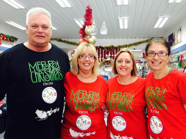 The owners of the Elanora Newsagency and Post Office, Stephen Tatt and Karla Rothpletz-Tatt with staff members. Picture: Supplied