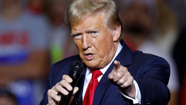 Former US President and Republican presidential candidate Donald Trump gestures as he speaks at a campaign rally at the Fiserv Forum in Milwaukee, Wisconsin, November 1, 2024. (Photo by KAMIL KRZACZYNSKI / AFP)