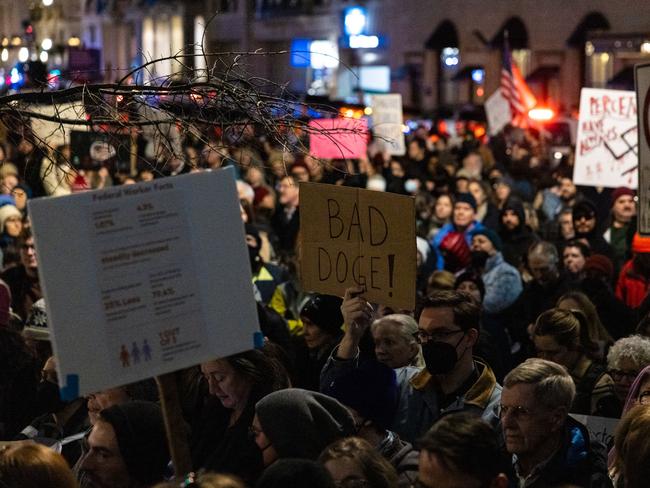 WASHINGTON, DC - FEBRUARY 4: Demonstrators participate in a rally in front of the U.S. Treasury Department in protest of Elon Musk and the Department of Government Efficiency on February 4, 2025 in Washington, DC. Several Democratic members of Congress joined the rally to protest Musk's access to the payment system of the Treasury, which houses the private information of millions of Americans.   Anna Rose Layden/Getty Images/AFP (Photo by Anna Rose Layden / GETTY IMAGES NORTH AMERICA / Getty Images via AFP)