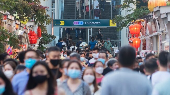 Mask up indoors in Singapore.