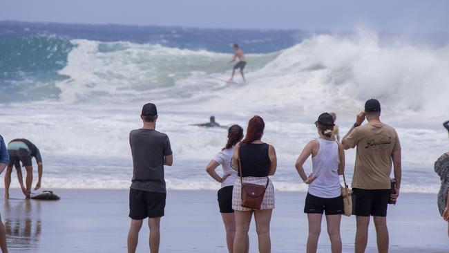 The crowds watching surfers at Snapper Rocks on Sunday 2 January 2022. Picture: Jerad Williams