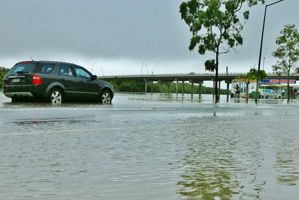 Flooding and big surf Maroochydore | The Courier Mail