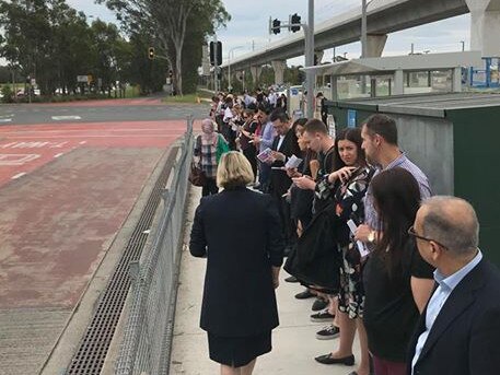 Huge line of people stuck waiting for buses this morning in Kellyville. Picture: Gav Lamb