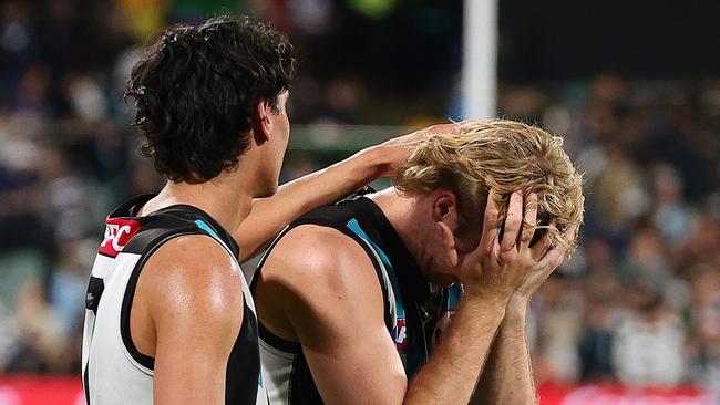 ADELAIDE, AUSTRALIA - SEPTEMBER 05: Jason Horne-Francis of the Power and Jase Burgoyne of the Power after the loss during the 2024 AFL Second Qualifying Final match between the Port Adelaide Power and the Geelong Cats at Adelaide Oval on September 05, 2024 in Adelaide, Australia. (Photo by Sarah Reed/AFL Photos via Getty Images)