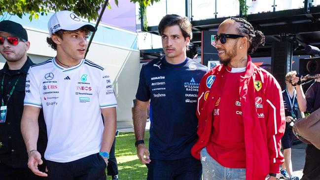 (Left to right) Andrea Kimi Antonelli, Carlos Sainz and Lewis Hamilton at Melbourne Park. Picture: Mark Stewart