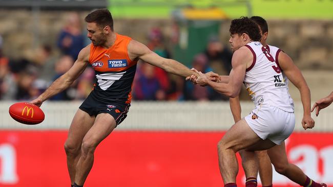 Stephen Coniglio comes under pressure against Brisbane.