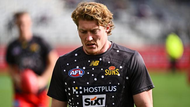 PERTH, AUSTRALIA - JUNE 23: Matt Rowell of the Suns warms up during the 2024 AFL Round 15 match between the Fremantle Dockers and the Gold Coast SUNS  at Optus Stadium on June 23, 2024 in Perth, Australia. (Photo by Daniel Carson/AFL Photos via Getty Images)