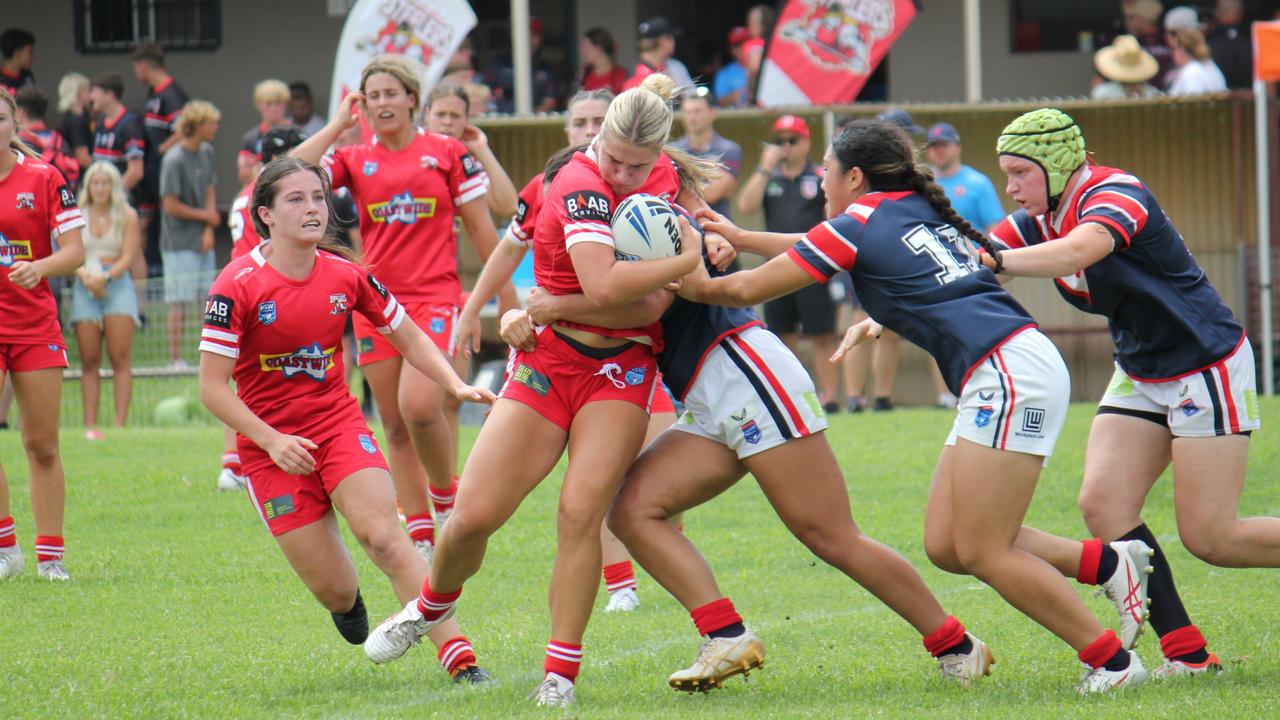 Brielle Luccitti taking a hit for the Illawarra Steelers Tarsha Gale Cup side. Picture: Kevin Merrigan