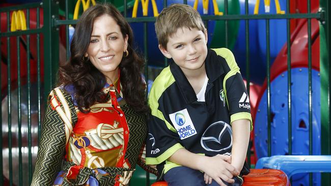 Ronald McDonald House Charities ambassador Lisa Wipfli with Carlo Moore, 11, a hospital patient at Ronald McDonald House, Randwick. Picture: John Appleyard