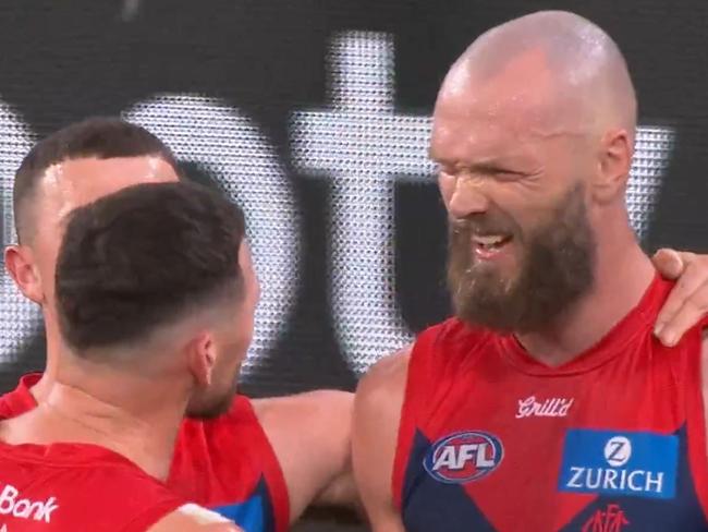 Max Gawn and Steven May face off after the final siren at the King's Birthday clash on Monday. R13