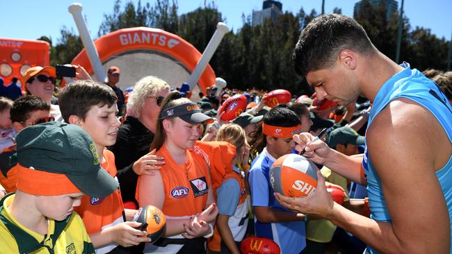 Signing autographs for Giants fans in 2019. Picture: AAP