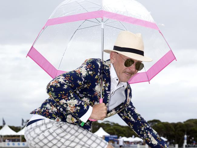 Jason Coleman dances in the rain. Picture: Sarah Matray<br/>