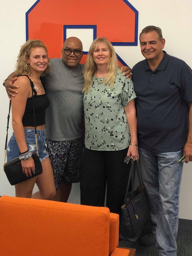 Tiana Mangakahia with her parents and her Syracuse coach Quentin Hillsman.