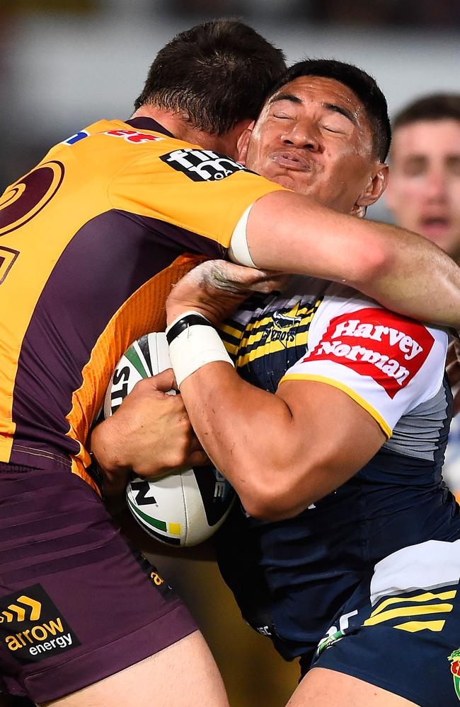 Jason Taumalolo of the Cowboys is tackled.