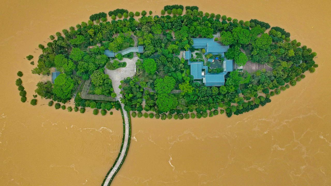 This aerial photo shows an island in Qingyuan, Guangdong province, submerged after heavy rains. Over 100,000 people were evacuated due to severe flooding, prompting China’s highest-level rainstorm warning. Picture: AFP