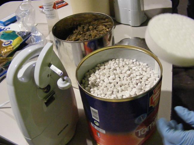 What AFP forensic officers discovered in thousands of tomato tins. Picture: Australian Federal Police