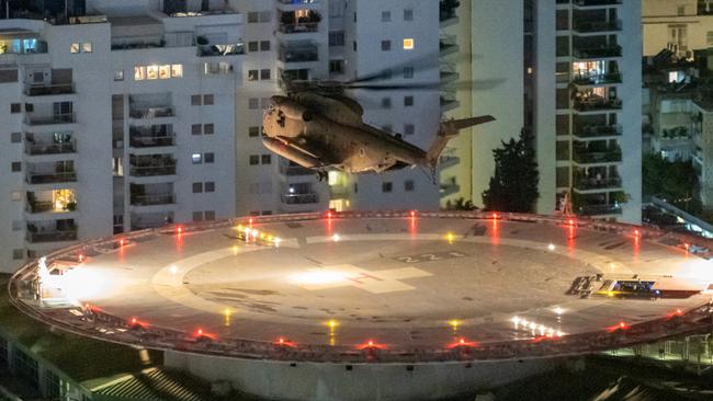 A helicopter ferrying released Israeli hostages lands in Tel Aviv on Monday night. Picture: Getty Images