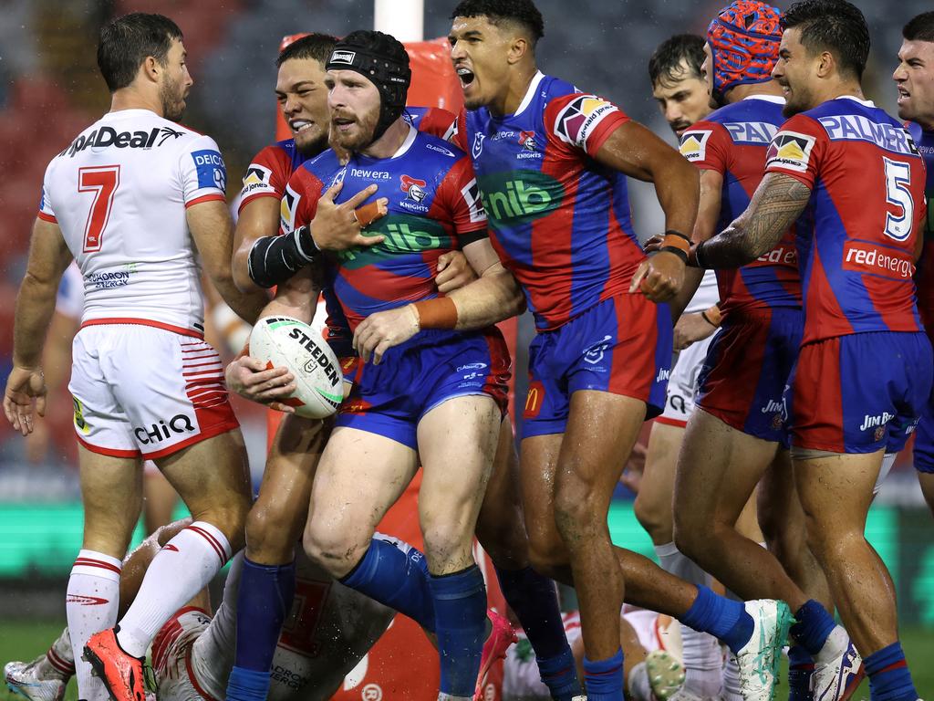 Jackson Hastings celebrates a try with his Knights teammates on his return to the team. Picture: Scott Gardiner/Getty Images