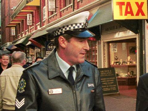 SA politician premier John Olsen, police officer Acting Senior Sergeant Paul Taggart and Attorney General Trevor Griffin announcing new Drug Diversion Laws in James Place 14 Jun 2000.