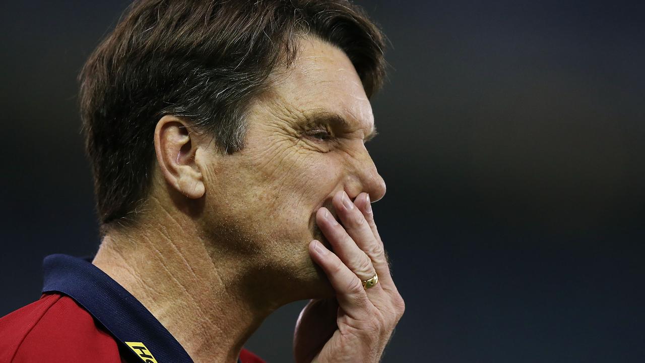 MELBOURNE, AUSTRALIA - AUGUST 30: Demons coach Paul Roos walks off after defeat during the round 23 AFL match between the North Melbourne Kangaroos and the Melbourne Demons at Etihad Stadium on August 30, 2014 in Melbourne, Australia. (Photo by Michael Dodge/Getty Images)