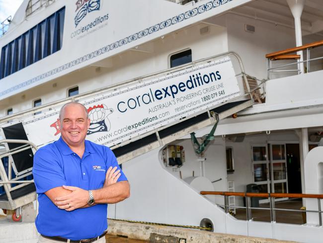 Coral Expeditions commercial director Jeff Gillies beside the Coral Discoverer. Picture: Supplied