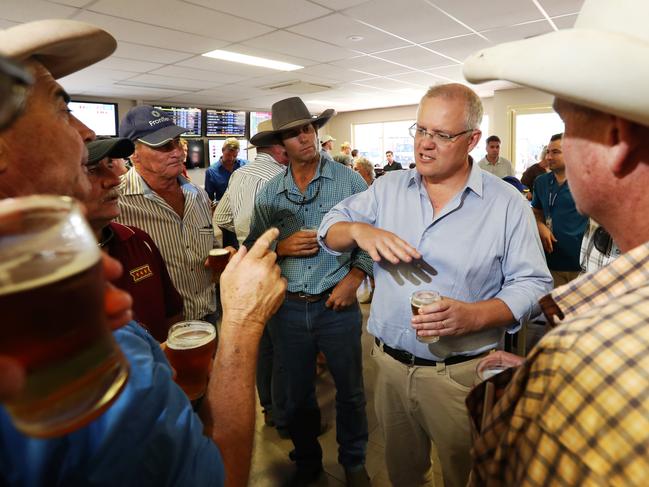 Prime Minister Scott Morrison talks to farmers at Gannons Pub in Julia Creek. Picture: Nigel Hallett