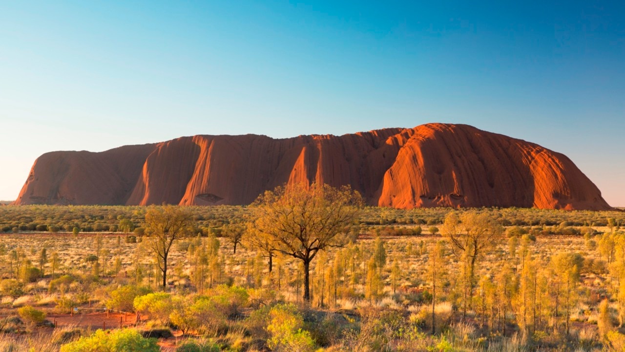 Hanson defends decision to climb Uluru