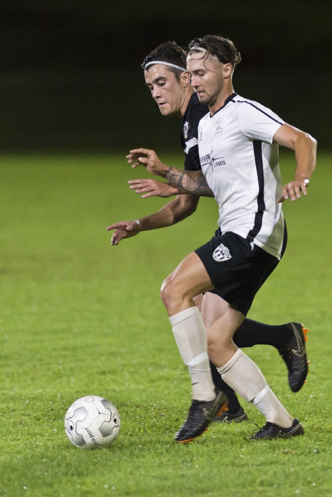 Matthew Meiklejohn (left) of Willowburn White and Nik Lawson of Willowburn battle for possession in Toowoomba Football League Premier Men round five at Commonwealth Oval, Saturday, March 30, 2019. Picture: Kevin Farmer