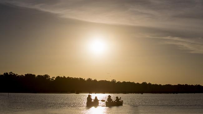 A family in canoes on the Barmah Lake. Picture: Supplied