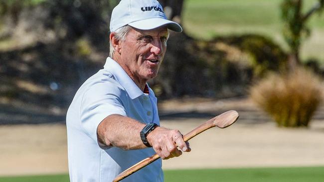 LIV Golf organiser Greg Norman gestures to the crowd while holding an Australian native boomerang on the first day of the 2023 LIV Golf tournament in Adelaide on April 21, 2023. (Photo by Brenton Edwards / AFP) / -- IMAGE RESTRICTED TO EDITORIAL USE - STRICTLY NO COMMERCIAL USE --