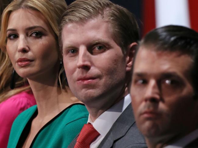 (FILES) This October 9, 2016 file photo shows family members of Republican Presidential-elect Donald Trump, (from L-R) wife Melania Trump, daughter Ivanka Trump, and sons Eric Trump and Donald Trump Jr.as they listen to the second presidential debate at Washington University in St. Louis, Missouri. Donald Trump shook up his White House transition team Friday by appointing running mate Mike Pence as its chairman and naming a cohort of Washington insiders -- along with three of his children -- to the operation. Three of Trump's grown children -- Don Jr, Eric and Ivanka -- and son-in-law Jared Kushner were also named to the team's executive committee, a move that could raise serious questions about conflicts of interest. / AFP PHOTO / Tasos Katopodis