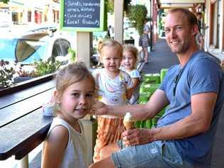 CHASING A DREAM: Guy Batters and his family on holiday from Mornington Peninsula, Victoria, enjoying an icecream in Bangalow's main street. From Left, Charlie, Penny, Asher and Guy. Mr Batters said it was his wife's dream to move to Bangalow. Picture: Karin von Behrens