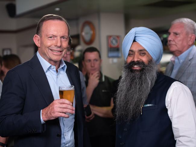 The Liberal Member for Warringah Tony Abbott with local Jagvinder Singh Virk. Picture: Monique Harmer 