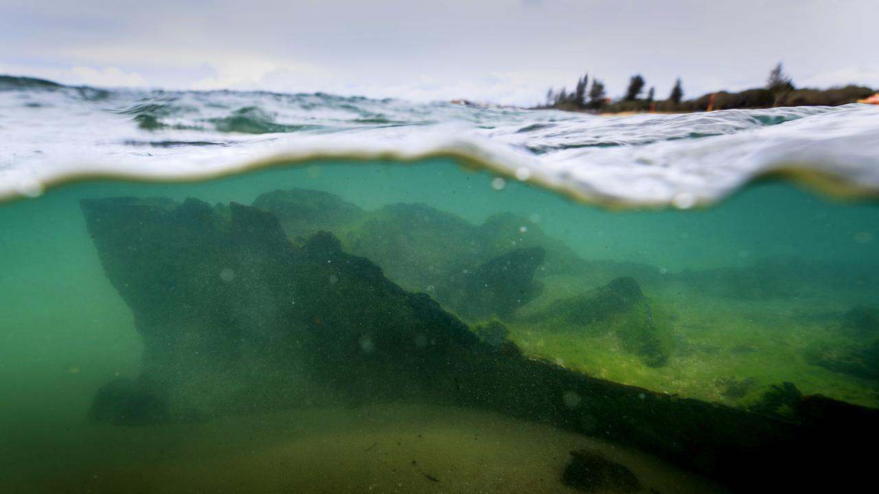 The ghostlike remains of SS Dicky lie just below the surface at Caloundra.