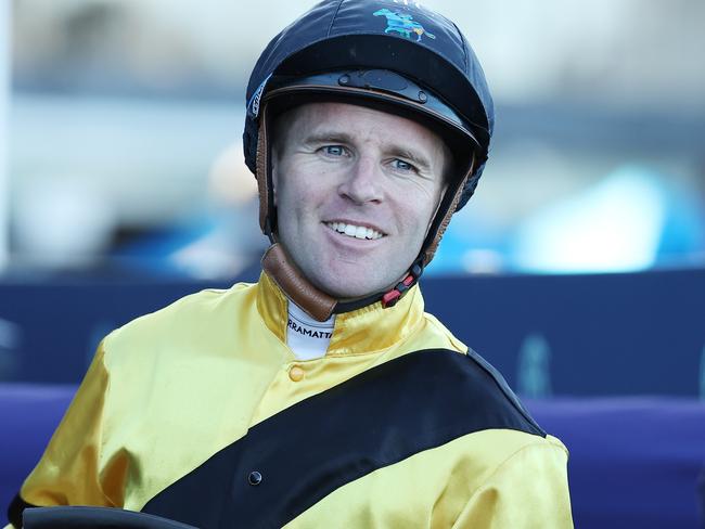 SYDNEY, AUSTRALIA - AUGUST 03: Tommy Berry riding Nosey Parker wins Race 7 Jockeys Celebration Day during Sydney Racing at Rosehill Gardens on August 03, 2024 in Sydney, Australia. (Photo by Jeremy Ng/Getty Images)