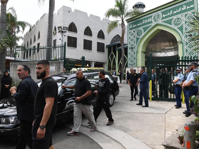 The hearse carrying the coffin of Mahmoud 'Mick' Hawi leaves after his funeral at the Fatima Al-Zahra Masjid in Arncliffe. Picture: AAP