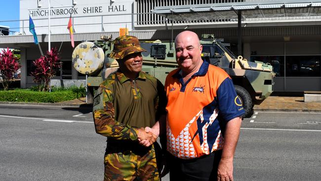 Australian Defence Force Deputy Commander 3rd Brigade Colonel Boniface Aruma with Hinchinbrook Mayor Ramon Jayo outside the Hinchinbrook Shire Council in Ingham. Picture: Cameron Bates